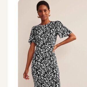 Boden  size 10 jersey midi dress with black and white floral pattern.